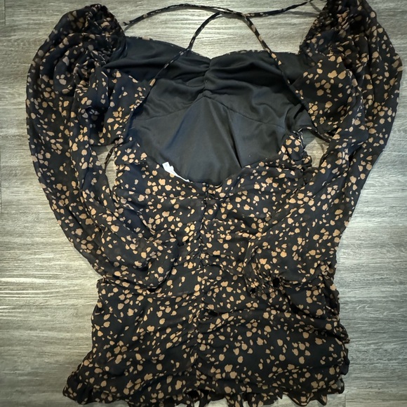 Open back mid length dress, brand All In Favor from Francesca’s Boutique. - Picture 2 of 3